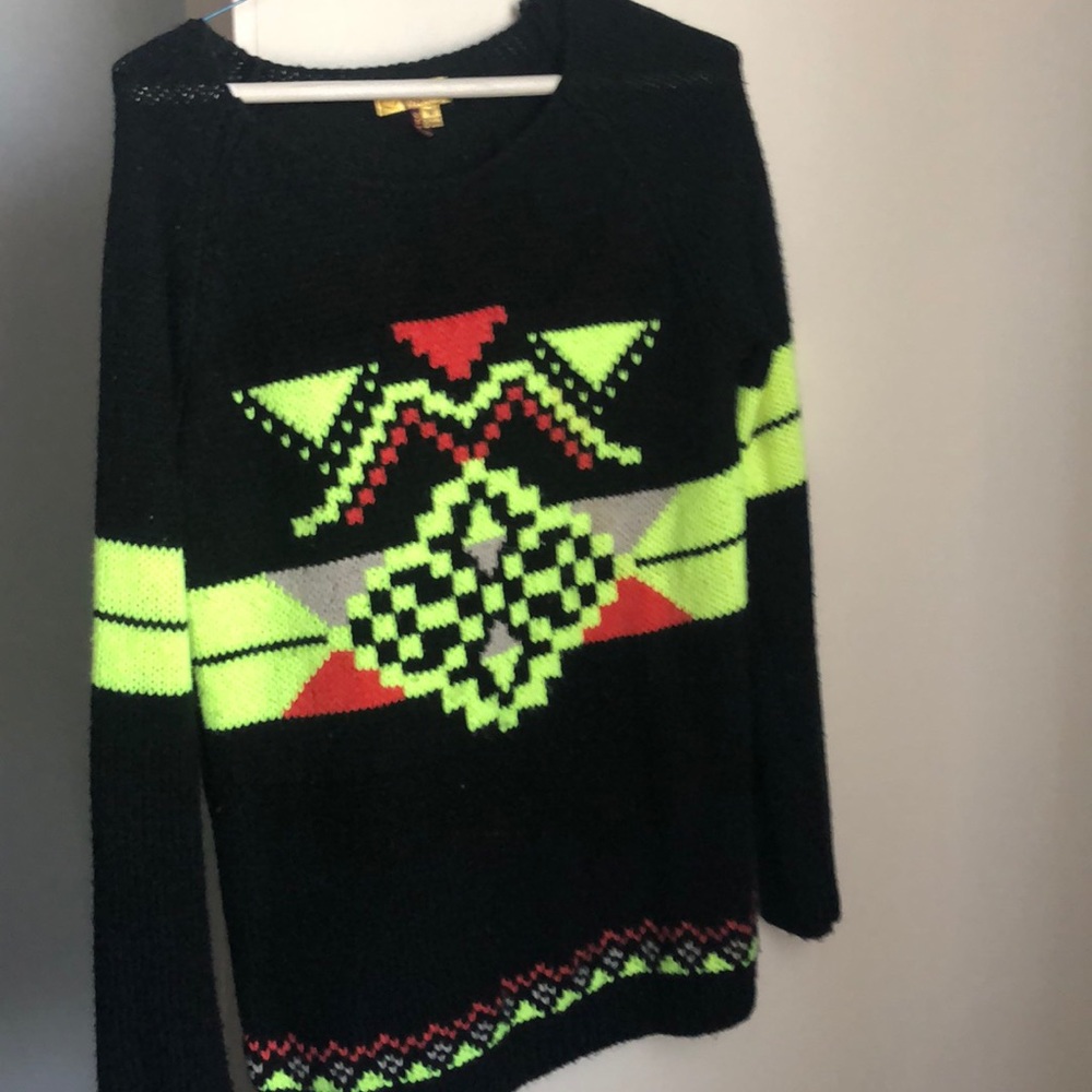 Black, yellow, orange, and grey sweater